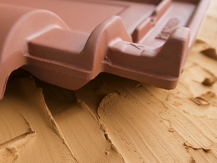 Clay roof tiles with raw clay